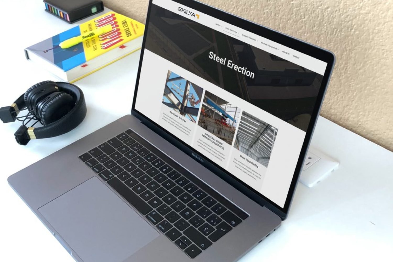 MacBook Pro on white desk