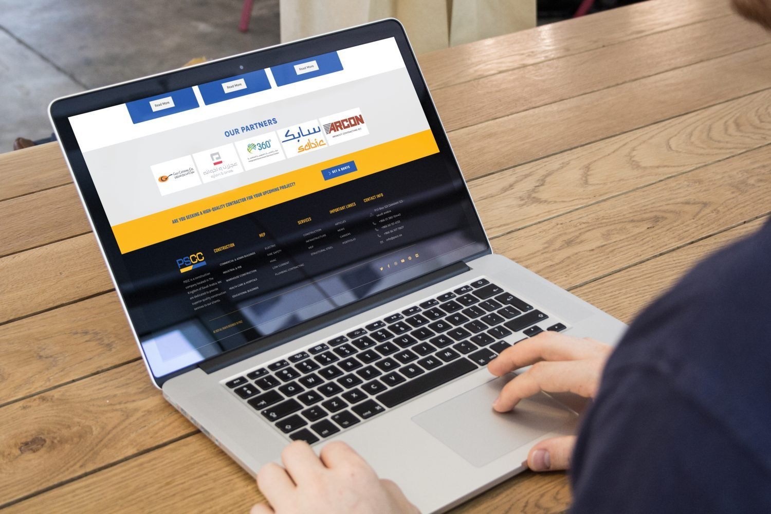 Macbook Pro on light wooden table