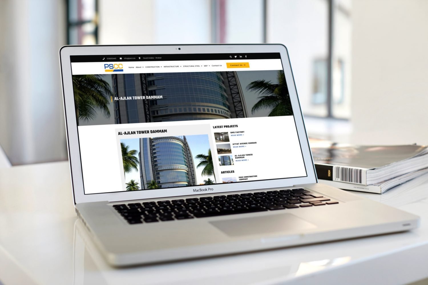 Macbook Pro on white table