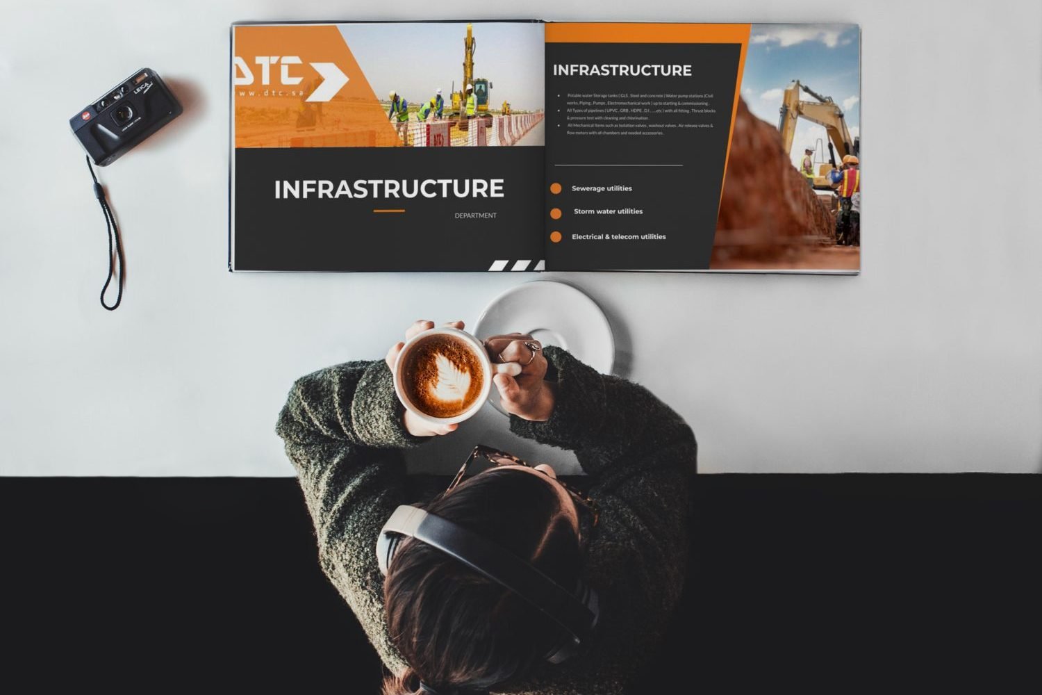 Woman reading coffee table book